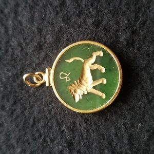 Jade lion pendant